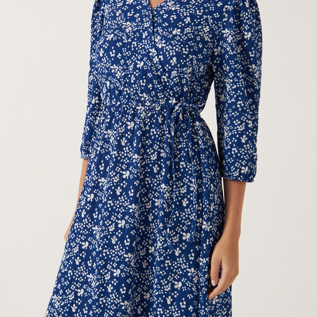 Robe midi à col en V et manches bouffantes